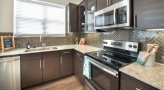 under cabinet lighting in kitchen with window