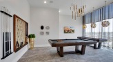 billiards table in game room