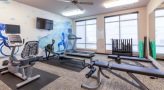 large windows brighten fitness center