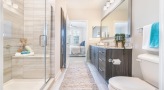 a bathroom with walk-in shower