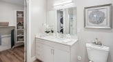 a bathroom with walk-in closet