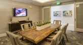 conference room with a large table surrounded by chairs