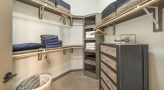 walk-in closet with shelving