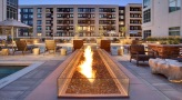 poolside fire pit and lounge chairs