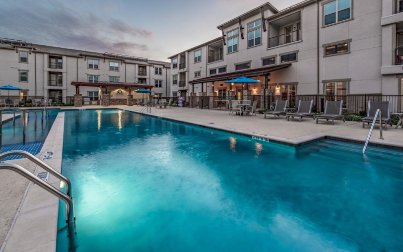 swimming pool lit at night