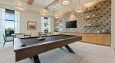 billiards table in game room