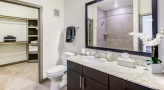 bathroom with walk-in closet