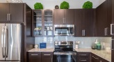 a kitchen with under-cabinet lighting