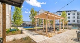 courtyard with pickleball court and pergola