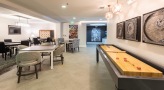 shuffleboard table in game room