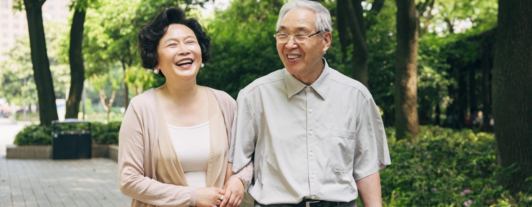 Couple walking in a local park