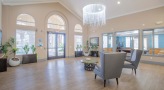 lobby area with chairs and a table