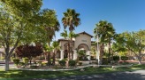 exterior of a building with palm trees
