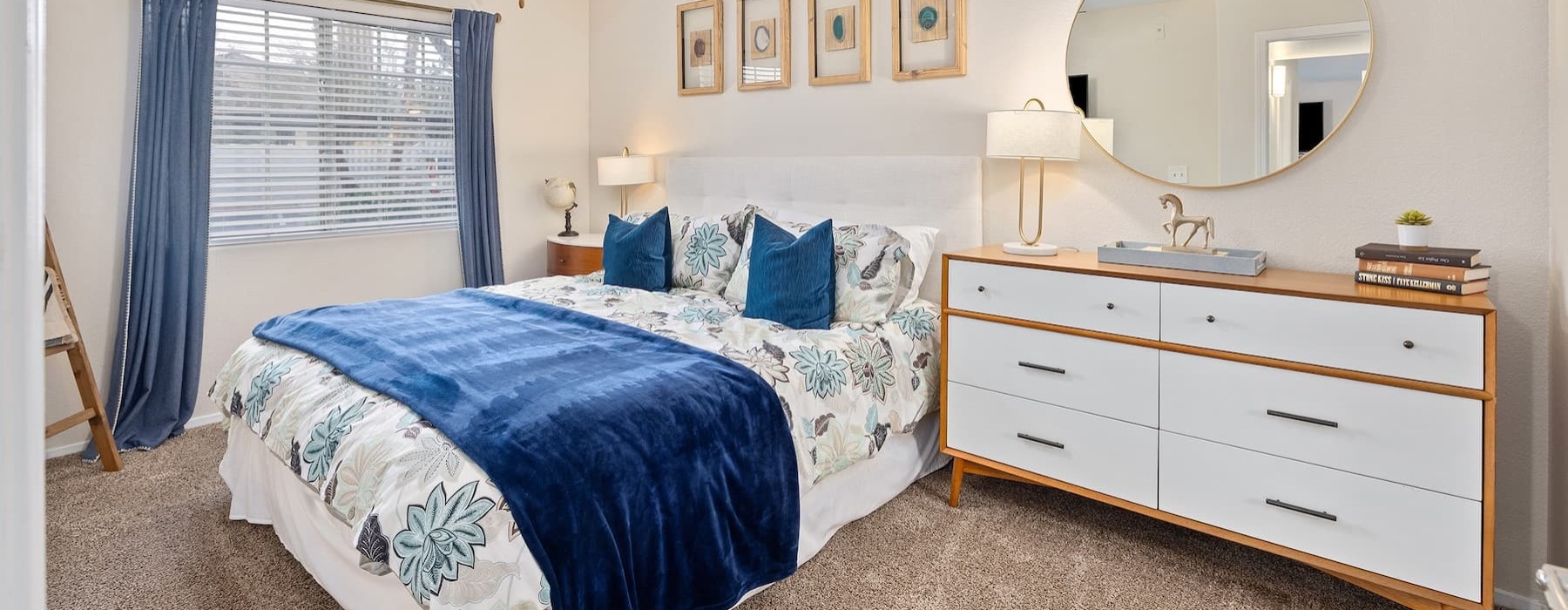 bedroom with ample space around the bed and bright lighting