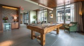 game room with billiards table