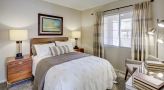 bedroom with a large window