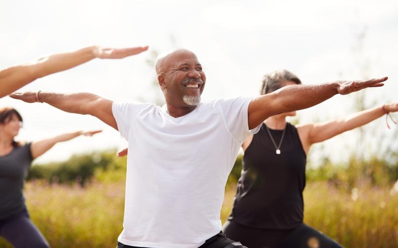 people doing yoga outside