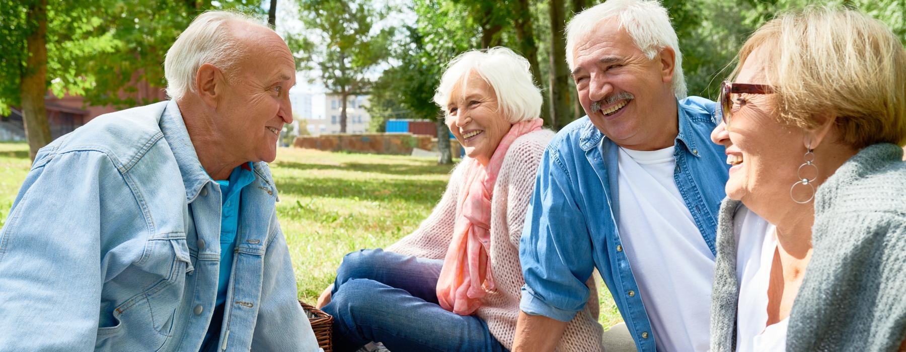 a group of people having a picnic outside