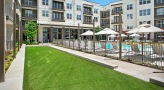 Large greenspace next to the pool 