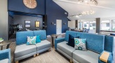 social seating area with blue couches