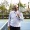 a man on a tennis court holding a raquet
