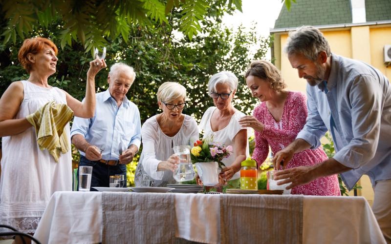 Group of friends enjoying food and laughing