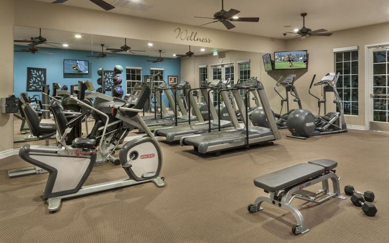 fitness center with exercise equipment