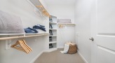 large closet with custom shelving