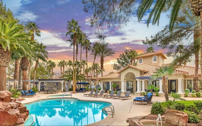Resort-style swimming pool with lounge seating
