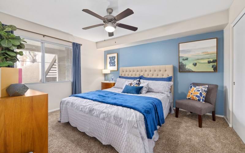 Bedroom with natural lighting and high ceilings