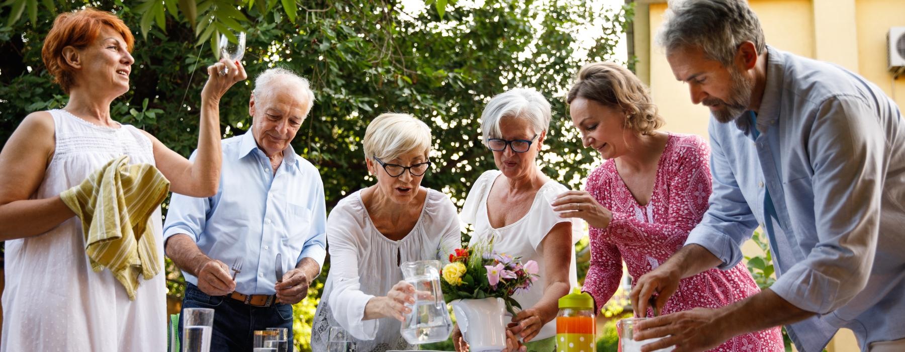 a group of people outside cooking