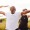 Group of people doing yoga outdoors 