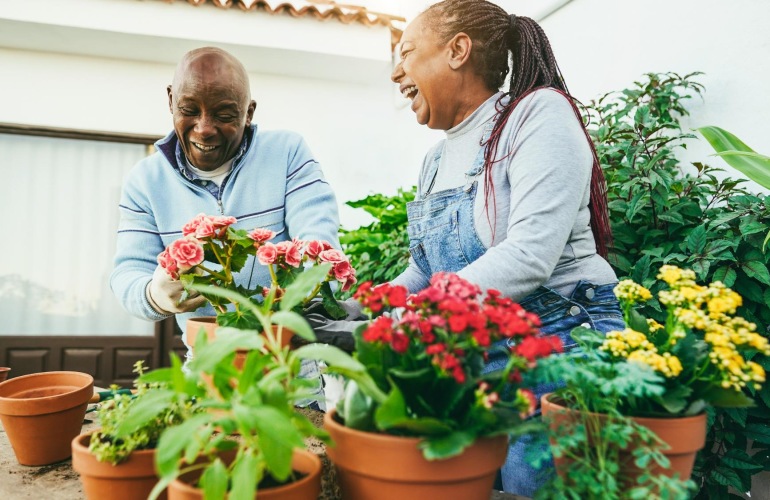 Friends working the community garden 