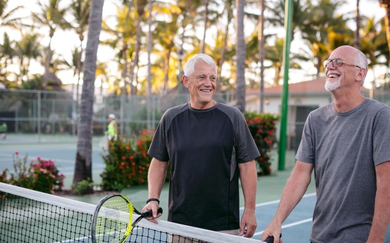 two men playing tennis