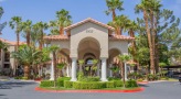 exterior of a building with palm trees