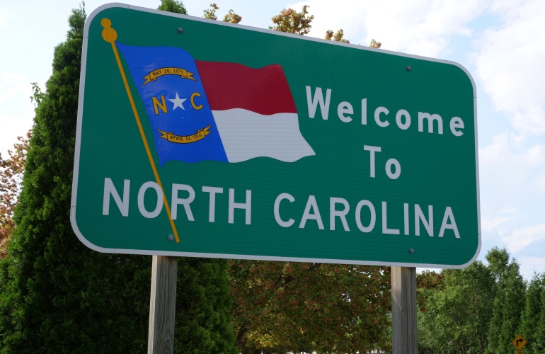 a sign that read welcome to North Carolina