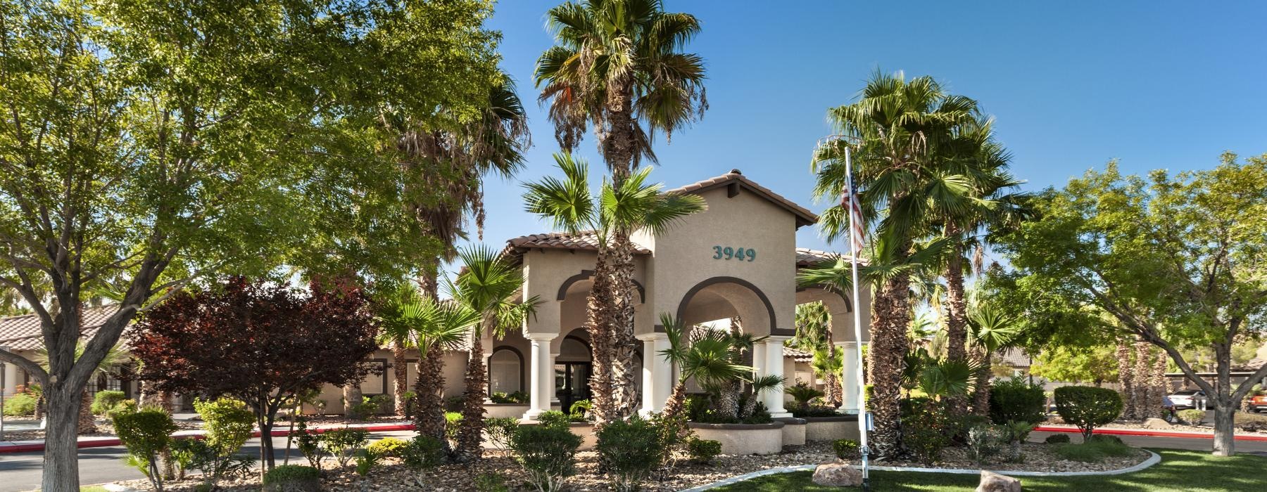 exterior of a building with palm trees