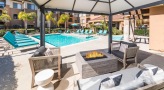 Large firepit next to the pool