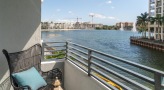 large balcony with a view of the water