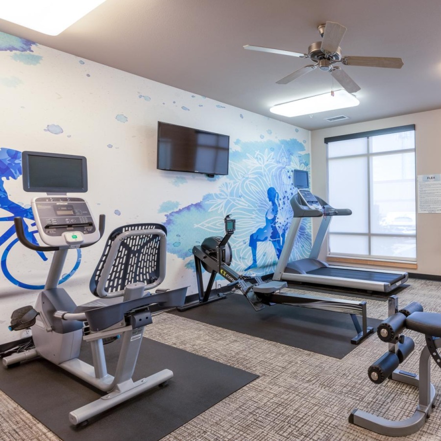 Easy Living large windows brighten fitness center