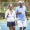 Couple walking on a tennis court after a match 