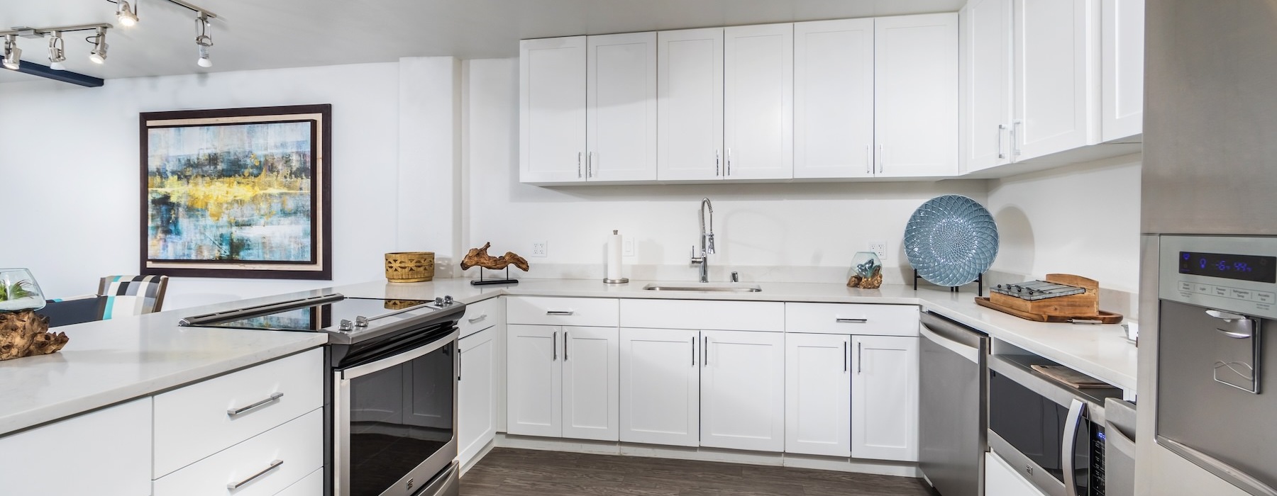 kitchen with white cabinets and stainless steel appliances