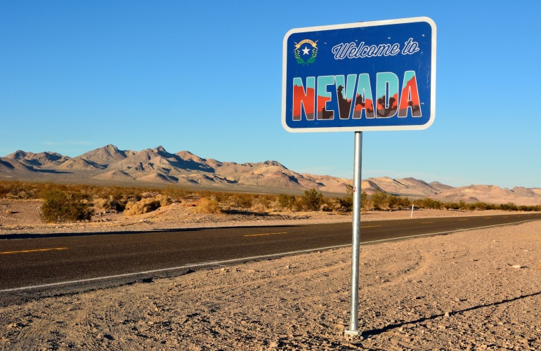a sign for the state line of Nevada