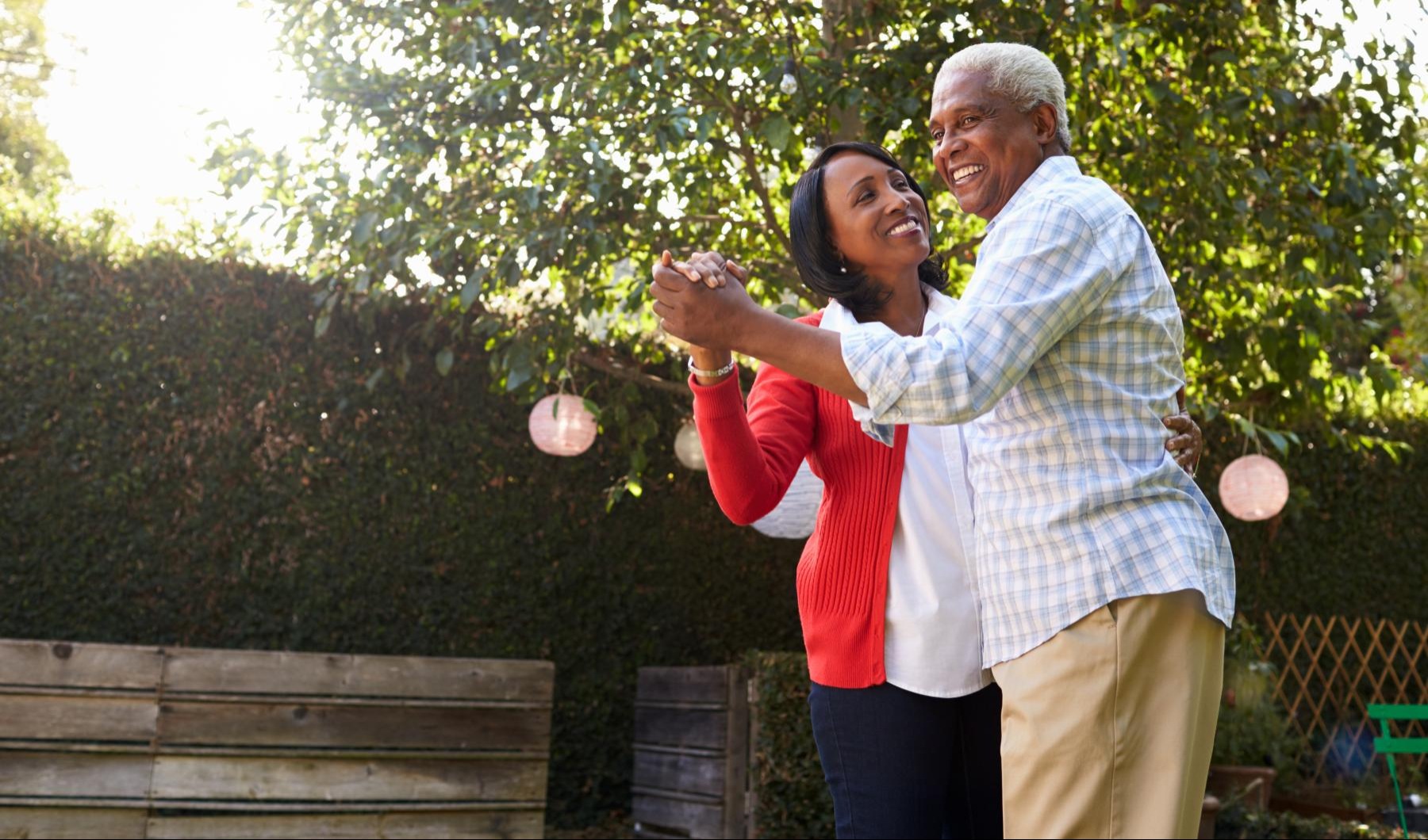 Couple Dancing Couple dancing outside smiling