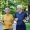 a man and a woman jog in the park together