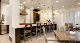 resident kitchen with bar stools