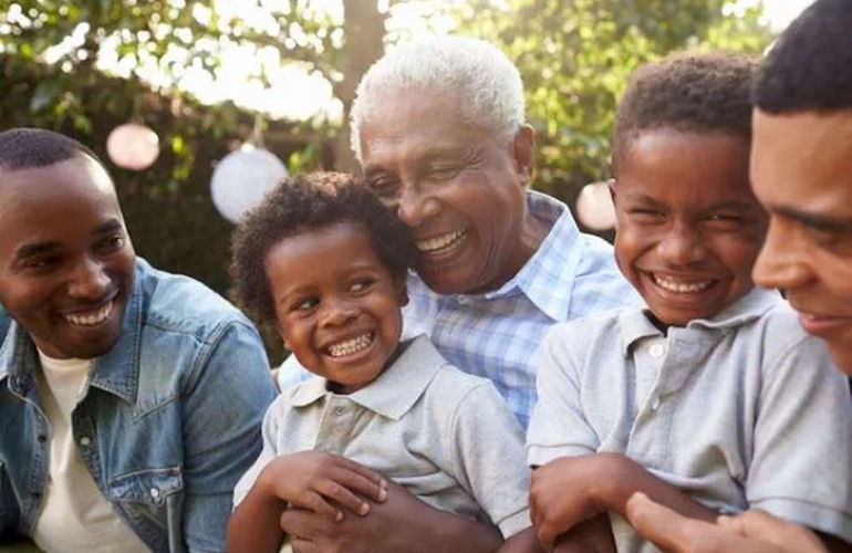 Grandfather spending time with his grandchildren.