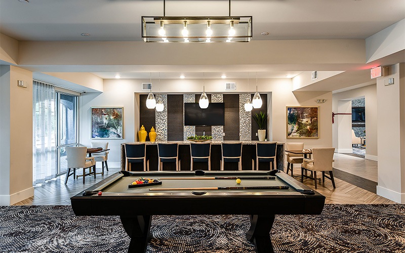 a pool table in a game room