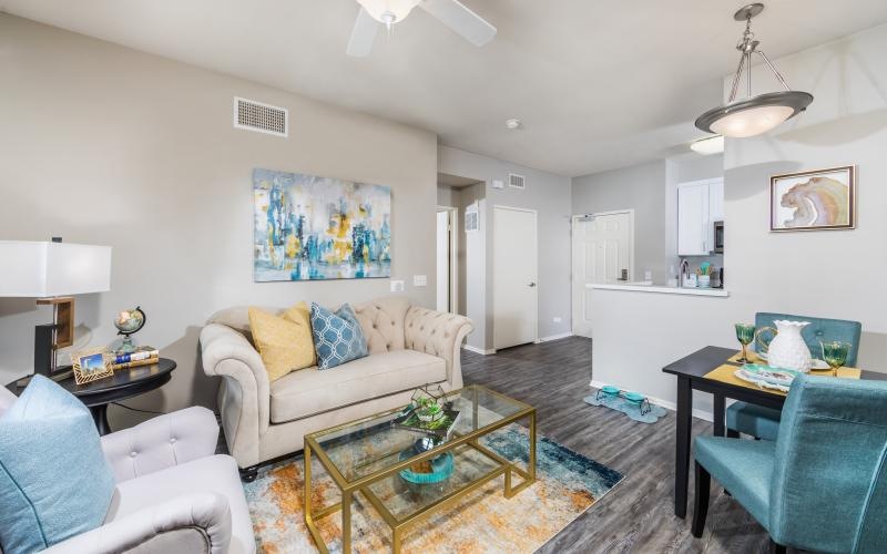 living room with couch and chairs