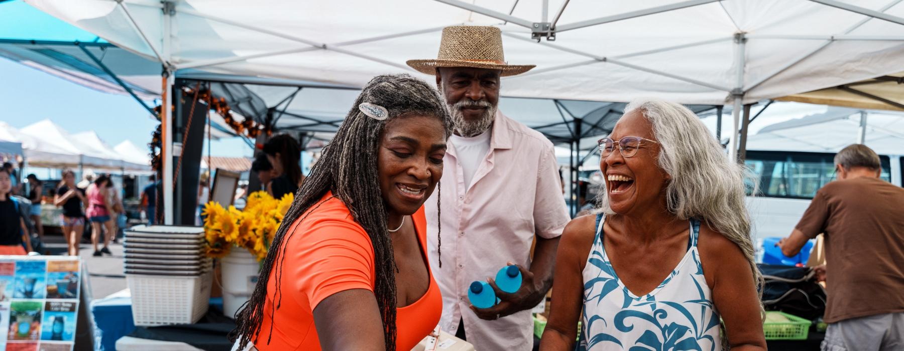 people at an outdoor market